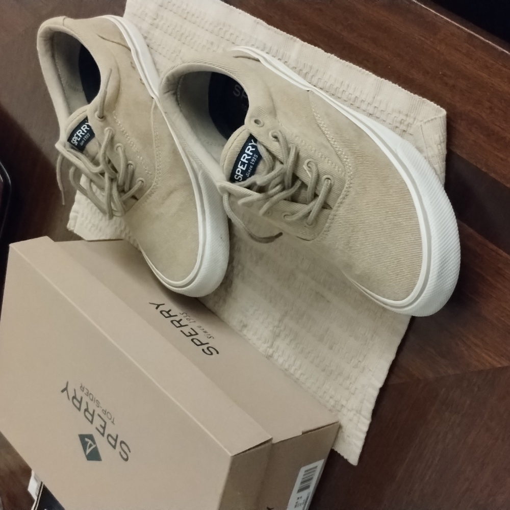 Size 10 and a half sand Sperry boat shoes
